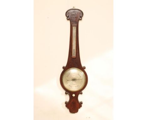 A MAHOGANY CASED WHEEL BAROMETER signed Bate, London, with thermometer, silvered dials, the case with scrolled edging, arched