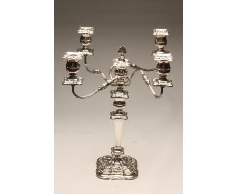 A SILVER FOUR BRANCH FIVE LIGHT CANDELABRUM, maker E H Parkin &amp; Co., Sheffield 1977, the leaf sheathed scroll branches wi