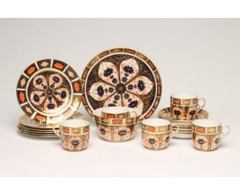 A ROYAL CROWN DERBY CHINA PART COFFEE SERVICE, 1919, painted in the Imari palette with pattern 1128, comprising six each sauc