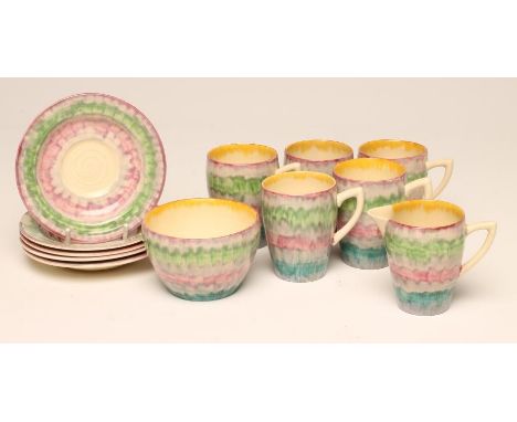 A CLARICE CLIFF WILKINSON POTTERY BIZARRE PART COFFEE SERVICE, 1930's, painted in green, pink and grey with a Delicia design,