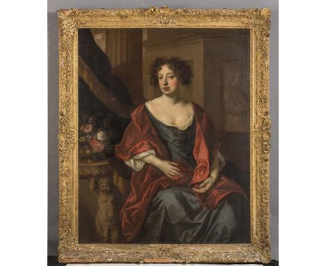 FOLLOWER OF SIR PETER LELY (1618-1680), Portrait of a Lady seated wearing a Blue Silk Dress and Red Shawl, three quarter leng