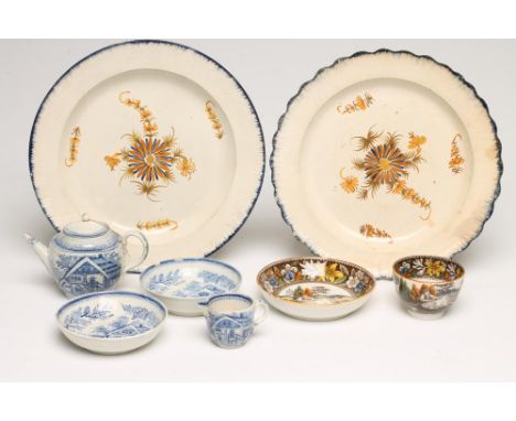 A PAIR OF PEARLWARE PLATES, probably Yorkshire/Don, c.1790, with feuille de chou moulded blue highlighted rims, centrally pai
