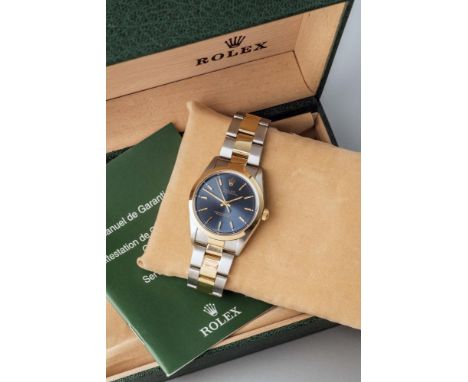 A GENTLEMAN'S ROLEX OYSTER PERPETUAL CHRONOMETER, the blue dial with applied gilt metal batons and centre sweep seconds, in a