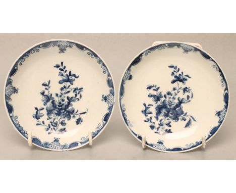 A PAIR OF FIRST PERIOD WORCESTER PORCELAIN SAUCERS, c.1760, painted in underglaze blue with the Mansfield pattern, workman's 