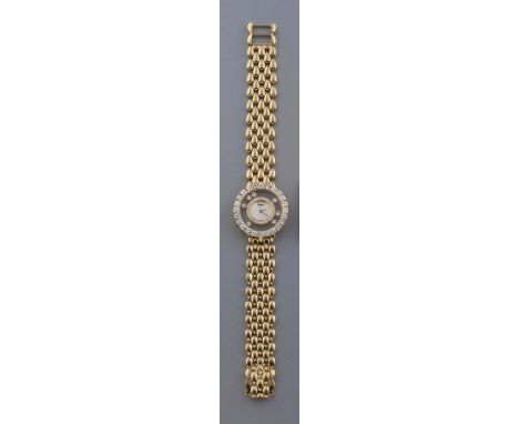 A LADY'S CHOPARD "HAPPY DIAMONDS" WRISTWATCH, the 1cm mother of pearl dial inscribed "Chopard, Geneve, Swiss Made", with a be
