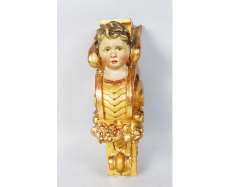 A 19TH CENTURY ITALIAN CARVED WOOD, PAINTED AND GILDED BRACKET. 16ins long.