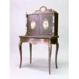 A VERY GOOD 19TH CENTURY FRENCH CABINET with floral painted oval panels and columns, double doors to