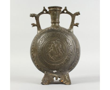 AN EARLY ITALIAN METAL TWO-HANDLED MOON FLASK, with circular panels of men on horseback. 11.5ins high.