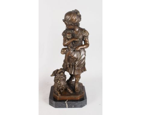 F. BARBEDIENNE A BRONZE OF A YOUNG GIRL holding two puppies, a dog at her side. Signed.  18ins high.