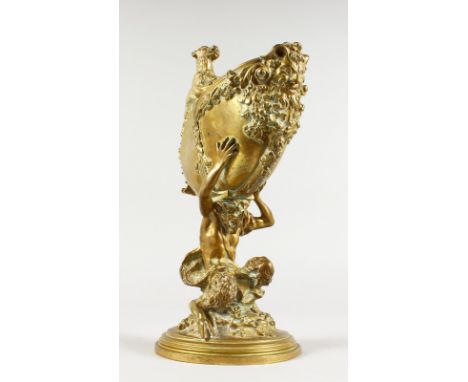 EMILE PINEDO (1840-1916) PARIS A CLASSICAL BRONZE GROUP, Pan holding aloft a moulded shell. Signed PINEDO.  12ins high.