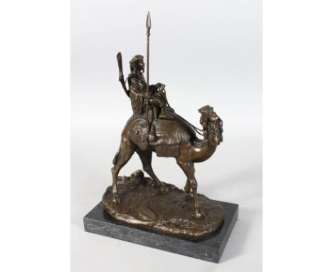 A. LEONARD. A BRONZE OF A MAN RIDING A CAMEL. Signed A. LEONARD.