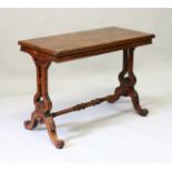 A VICTORIAN FIGURED WALNUT RECTANGULAR TOP CARD TABLE with folding top, on carved ends with