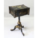 A GOOD VICTORIAN BLACK PAPIER MACHE TEAPOY, painted and inlaid with mother-of-pearl, opens to reveal