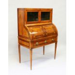 A GOOD 18TH CENTURY CONTINENTAL CYLINDER BUREAU, the upper section with a pair of glass doors over a