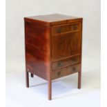 A GEORGIAN MAHOGANY WASH STAND, the rising top opening to reveal a glass interior over double