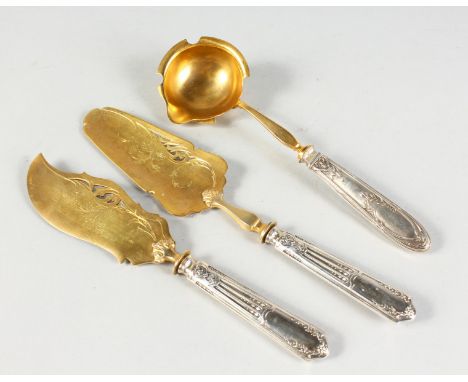 A GILDED TART KNIFE, SLICE AND LADLE.