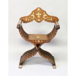 AN ISLAMIC IVORY INLAID CROSS FRAMED CHAIR.