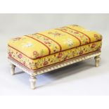 A GOOD NEEDLEWORK LONG STOOL on turned and painted legs. 3ft long x 1ft 5ins wide.