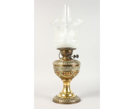A VICTORIAN OIL LAMP.