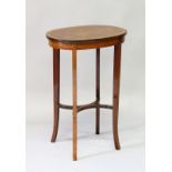 A GOOD VICTORIAN MAHOGANY INLAID OVAL OCCASIONAL TABLE with slender curving legs and under tier. 1ft