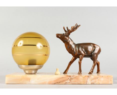 AN ART DECO LAMP, DEER ON A MARBLE BASE with yellow globe. 8.5ins long.