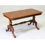 A VICTORIAN MAHOGANY RECTANGULAR TOP COFFEE TABLE with plain top, turned end supports, on curving