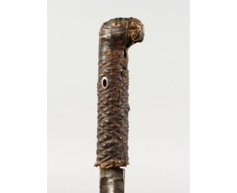 AN AFRICAN SWORD STICK, with bird handle. 3ft long.