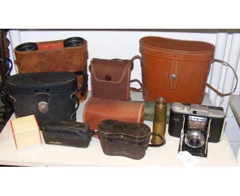 Vintage optical equipment, including binoculars and cameras 