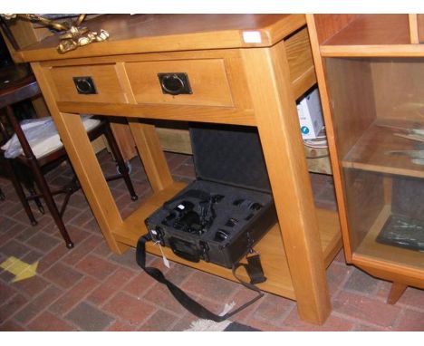 A contemporary light oak sideboard - width 100cm 
