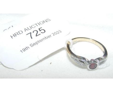A new 9ct ruby and diamond dress ring