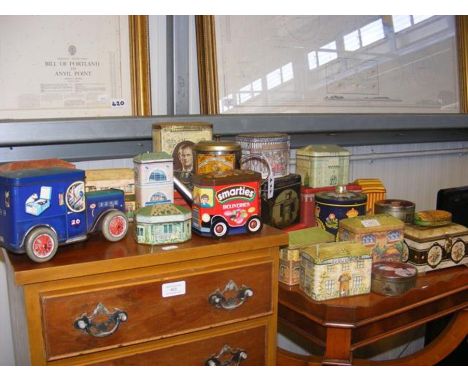 An assortment of vintage advertising tins 
