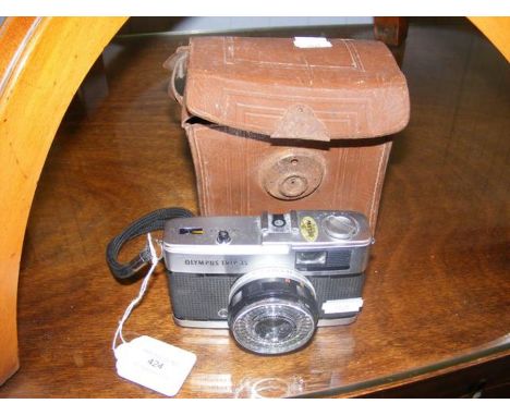 An Olympus Trip 35 vintage camera, together with one other 