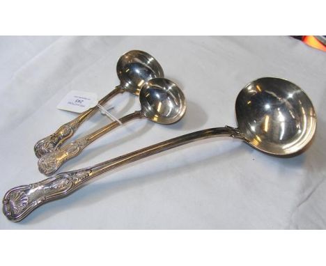 A large silver ladle, together with two smaller ditto - William Eley and William Fearn - London 1823 