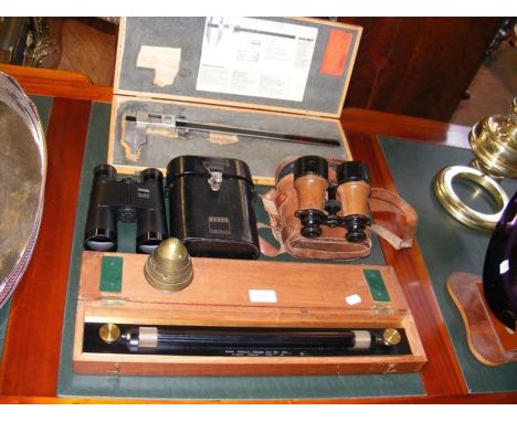 A parallel rolling ruler in case, together with vintage Zeiss binoculars etc.