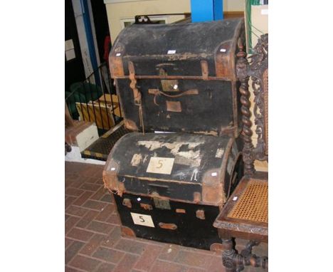 Two vintage trunks with domed lids