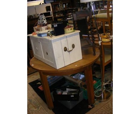 A circular oak dining table, together with a white painted chest, mahogany wine table and oak stick stand 