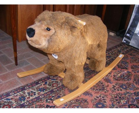 A Steiff 'rocking bear' - 86cms long with label