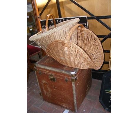 An old travelling trunk, together with cane work basket 