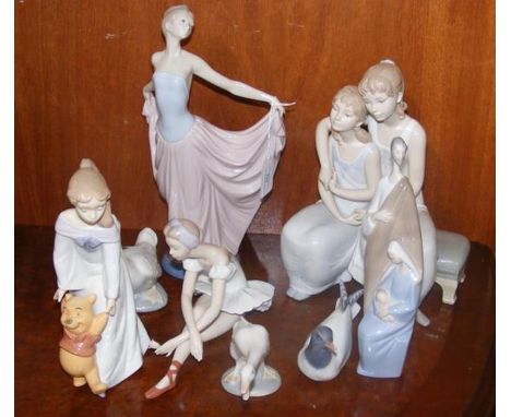 A quantity of Lladro and Nao figurines including Disney Collection