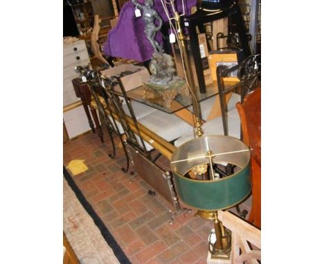 A standard lamp, a table lamp, two curtain rails and a fireguard 