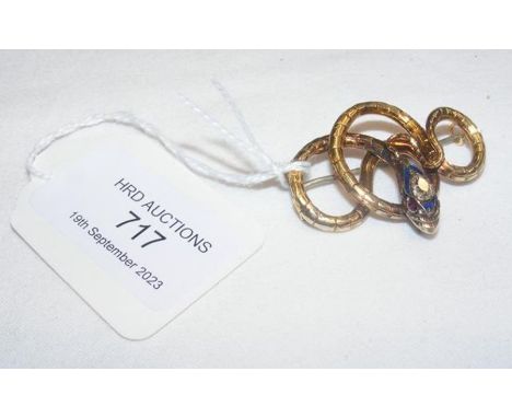 An antique gold 'snake' brooch with diamond and enamel head CONDITION REPORT Pear shaped diamond 5mm x 4mm.Raised 1mm out of 