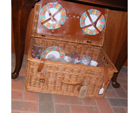 A vintage hamper by Ealing Hamper Company, complete with picnic ware