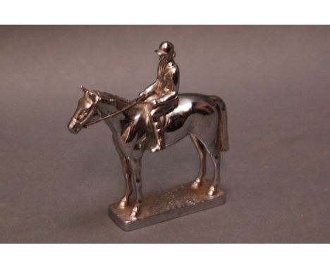 LL car mascot (Louis Lejeune), 20th century chrome plated model of a female fox hunter on horse.  Height 11 cm, "Made in Engl
