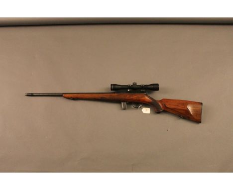 Tyrol Model 5522 .22 LR self- loading rifle, screw cut barrel, 10 shot magazine and telescopic sight.  Serial No. 69982.  FIR