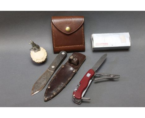 RWS leather bullet pouch, with space for 10 rounds, Victorinox Work Champ Swiss Army knife with toothpick and small screwdriv