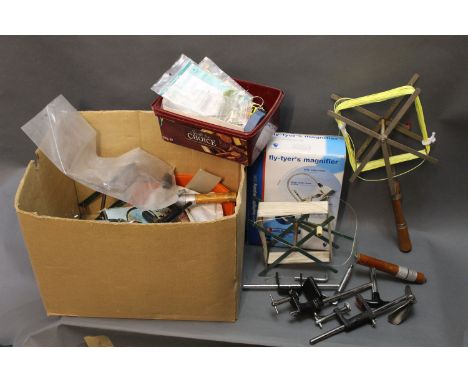 Large box containing fly tying equipment, to include vices, line winders, magnifiers, tools, etc. 