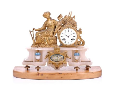 A late 19th-century J.W Benson 8-day figural spelter and alabaster mantle clock, with the figure of a seated Ceres with a she