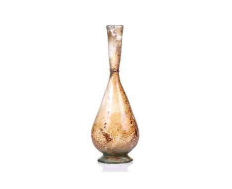 A Roman glass inverted baluster form flask with trail decorated neck, bearing an old handwritten collection label. 21 cm over