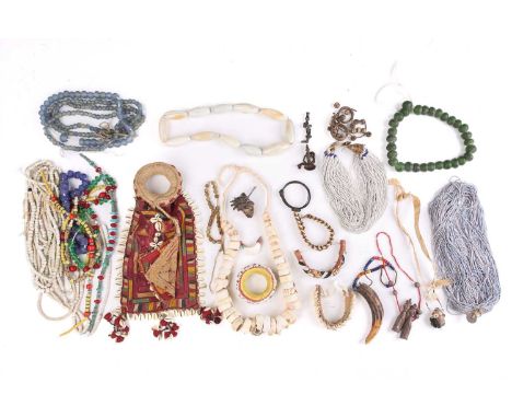 A large collection of principally West African jewellery, to include Ghanaian glass bead necklaces, cowrie shell bracelets, S