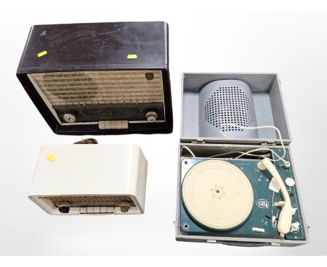 A Philips Bakelite valve radio, width 41cm, a further Philips radio and a GID tabletop record player.